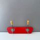 Red mid century coat rack