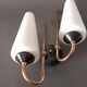 Pair of sconces in black metal and gilded brass 1960 Vintage.