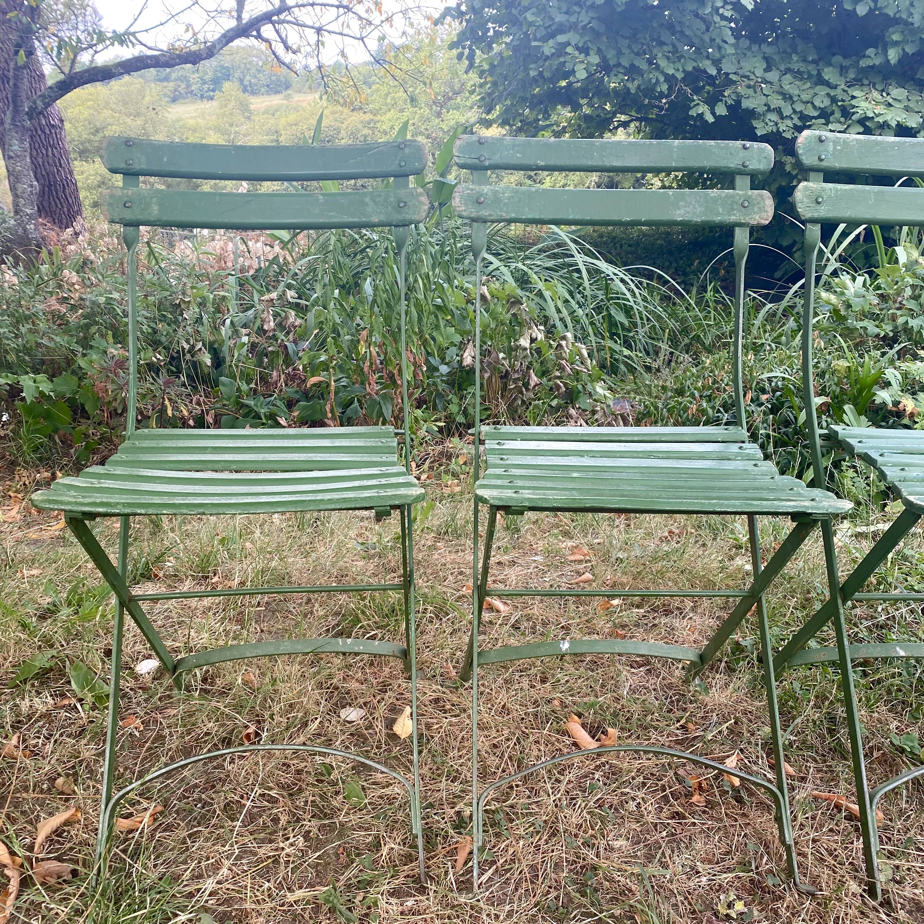 Antique folding garden chairs with wooden slats