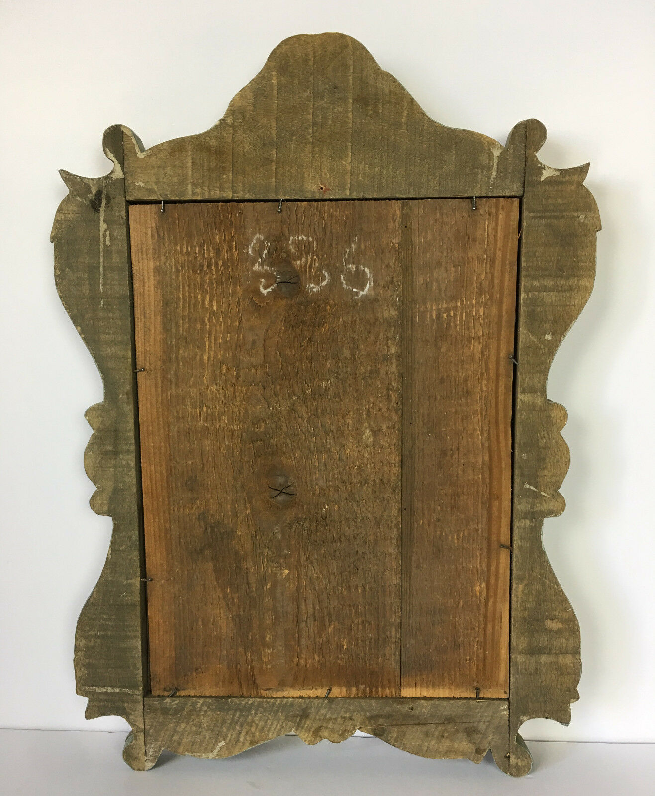 Gilded and patinated mirror sculpted 55 x 37cm