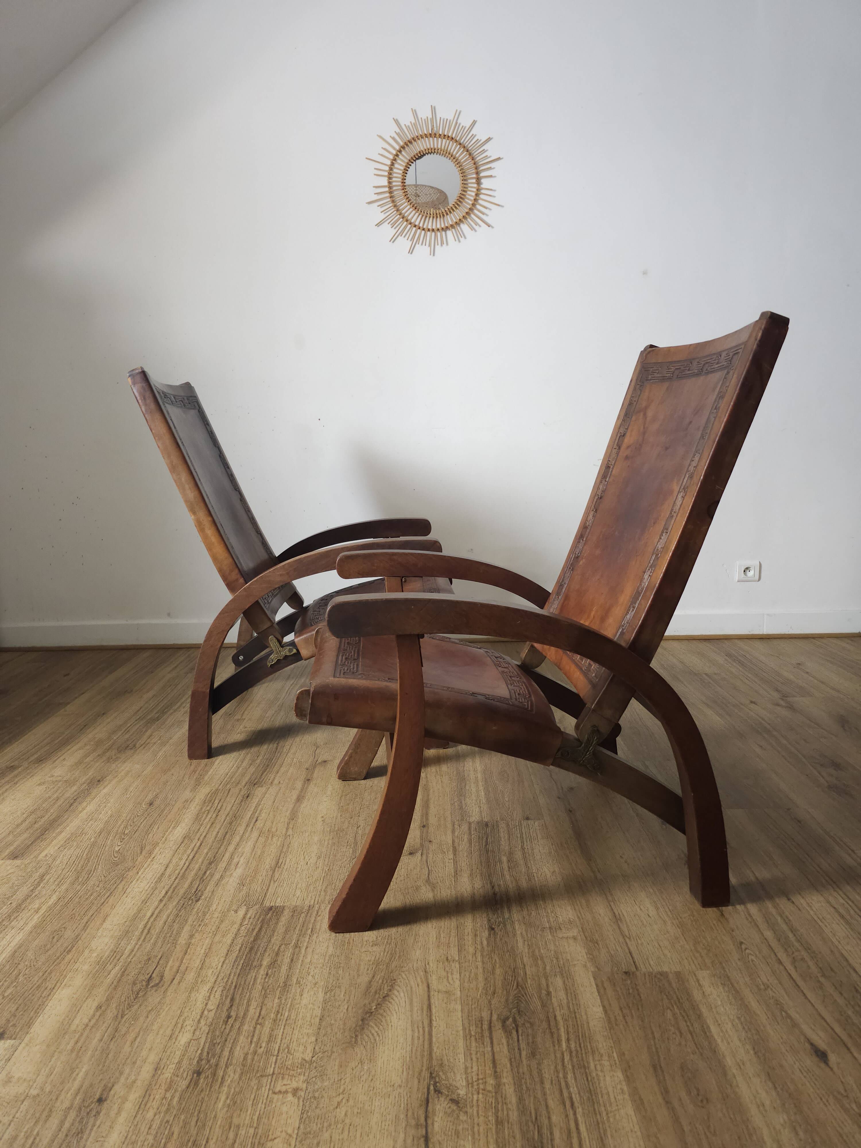 Leather and teak armchairs, by Angel Pazmino, circa 1960.