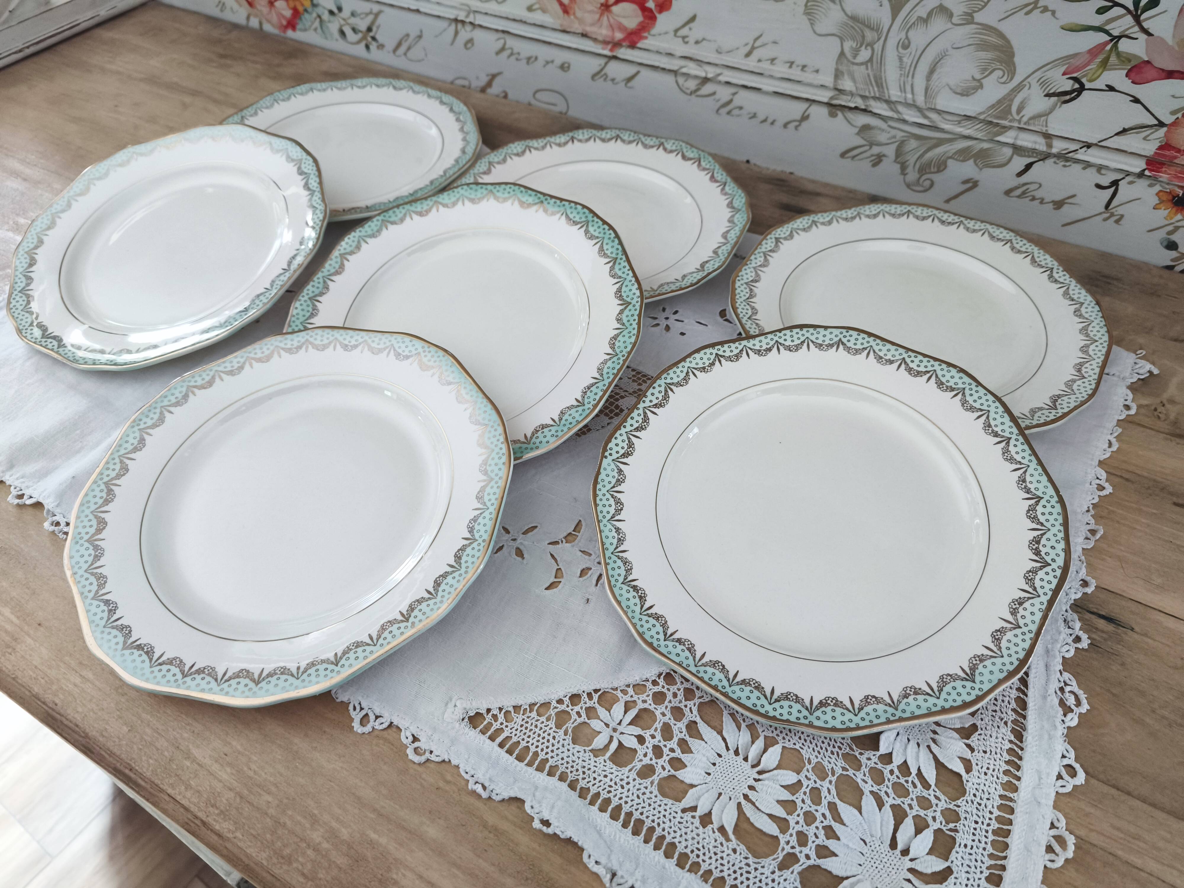 Set of 7 Longwy France earthenware dessert plates, Trianon model