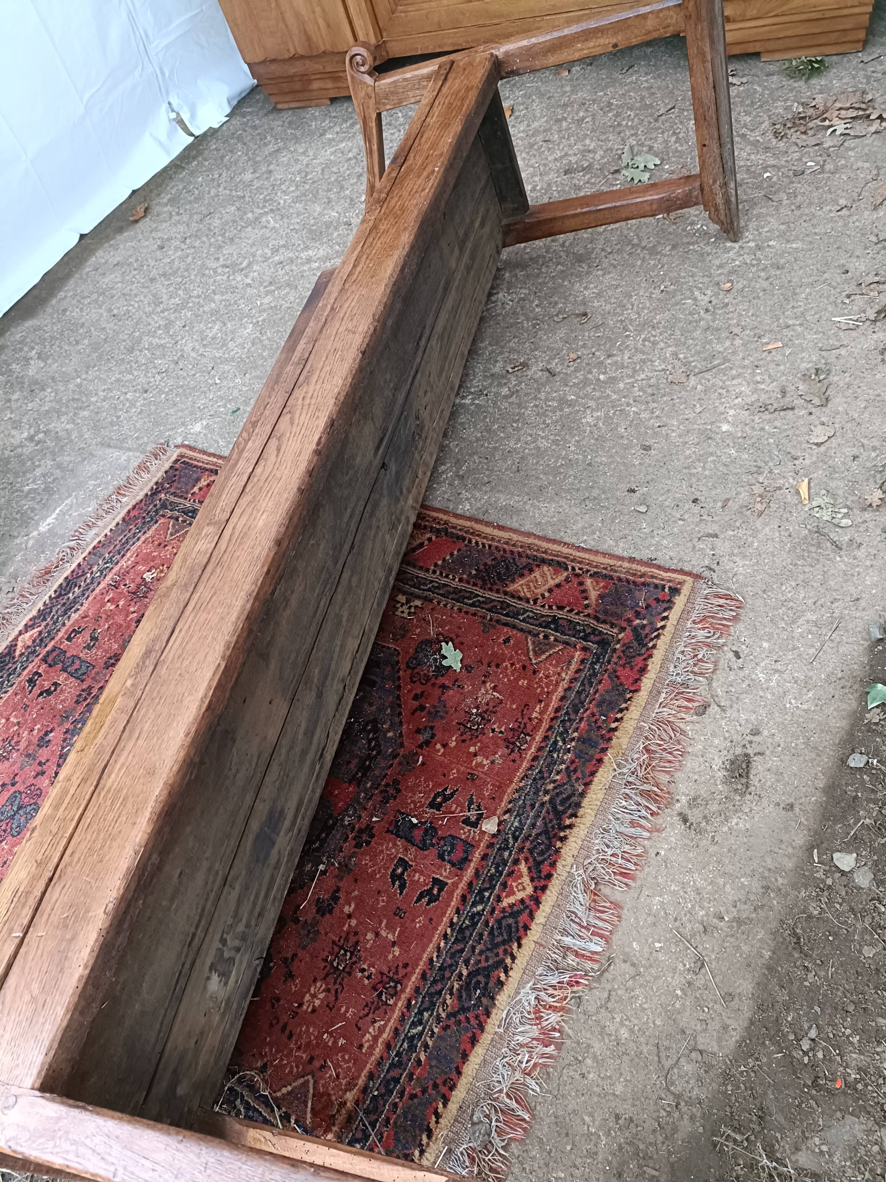 Oak church bench period XVII th century, back decorated with carved parchments