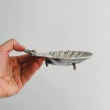 Metal shell pocket emptier