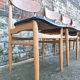 4 chaises en teck et skaï noir, Italie 1960