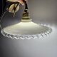 Wall sconces with scalloped opaline lampshades.