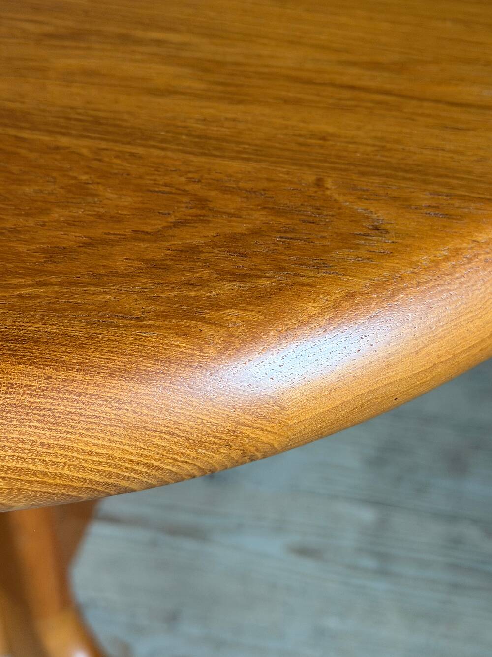 Vintage oval teak Scandinavian table with a central star base from Glostrup.