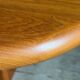 Vintage oval teak Scandinavian table with a central star base from Glostrup.