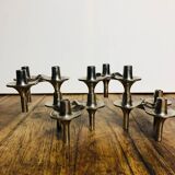 Modular chrome metal candle holders by Nagel & Stoffi. Set of 4