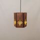 Older hanging lamp, made of metal with yellow prisms.