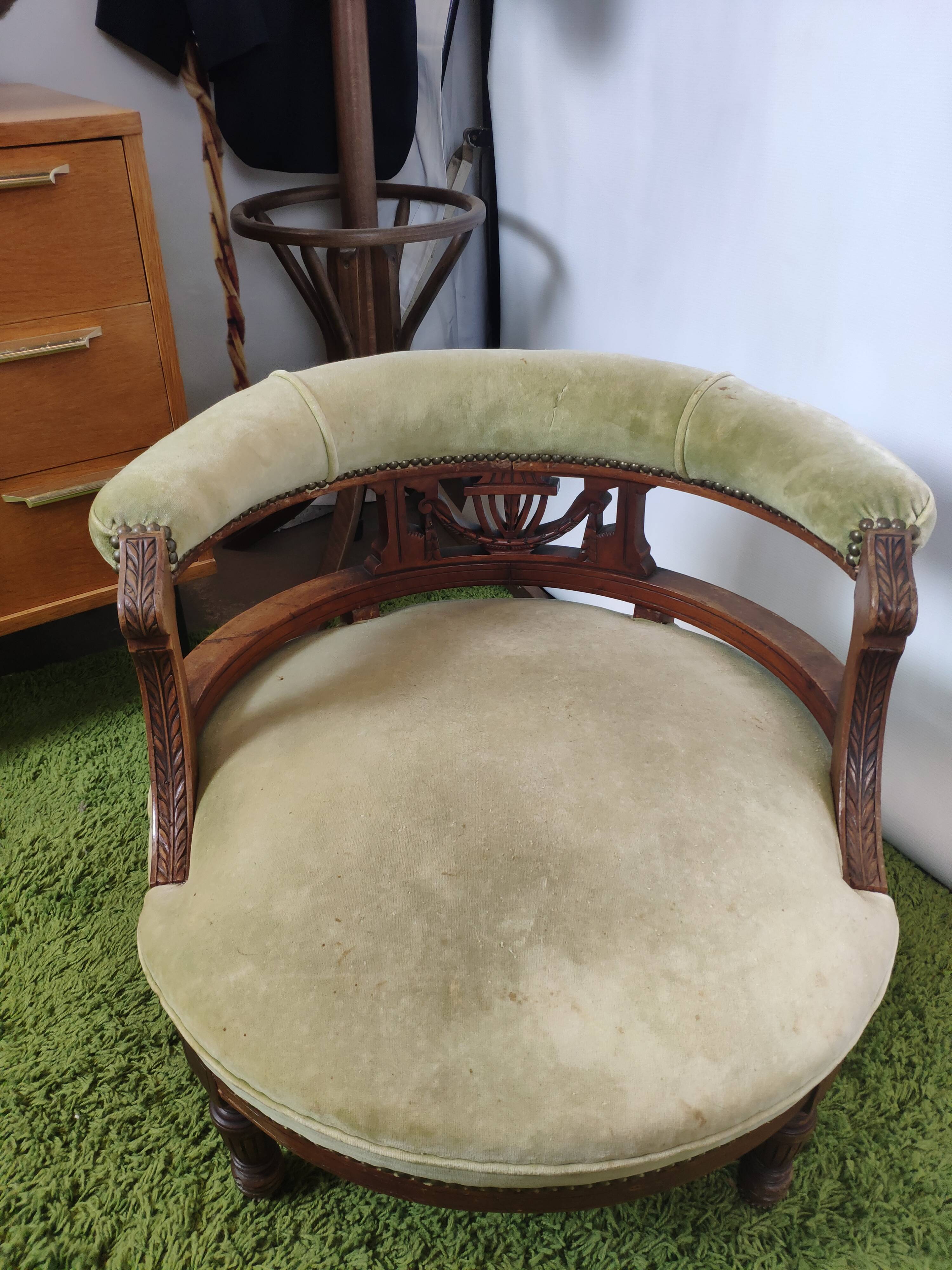 Old green velvet empire chair
