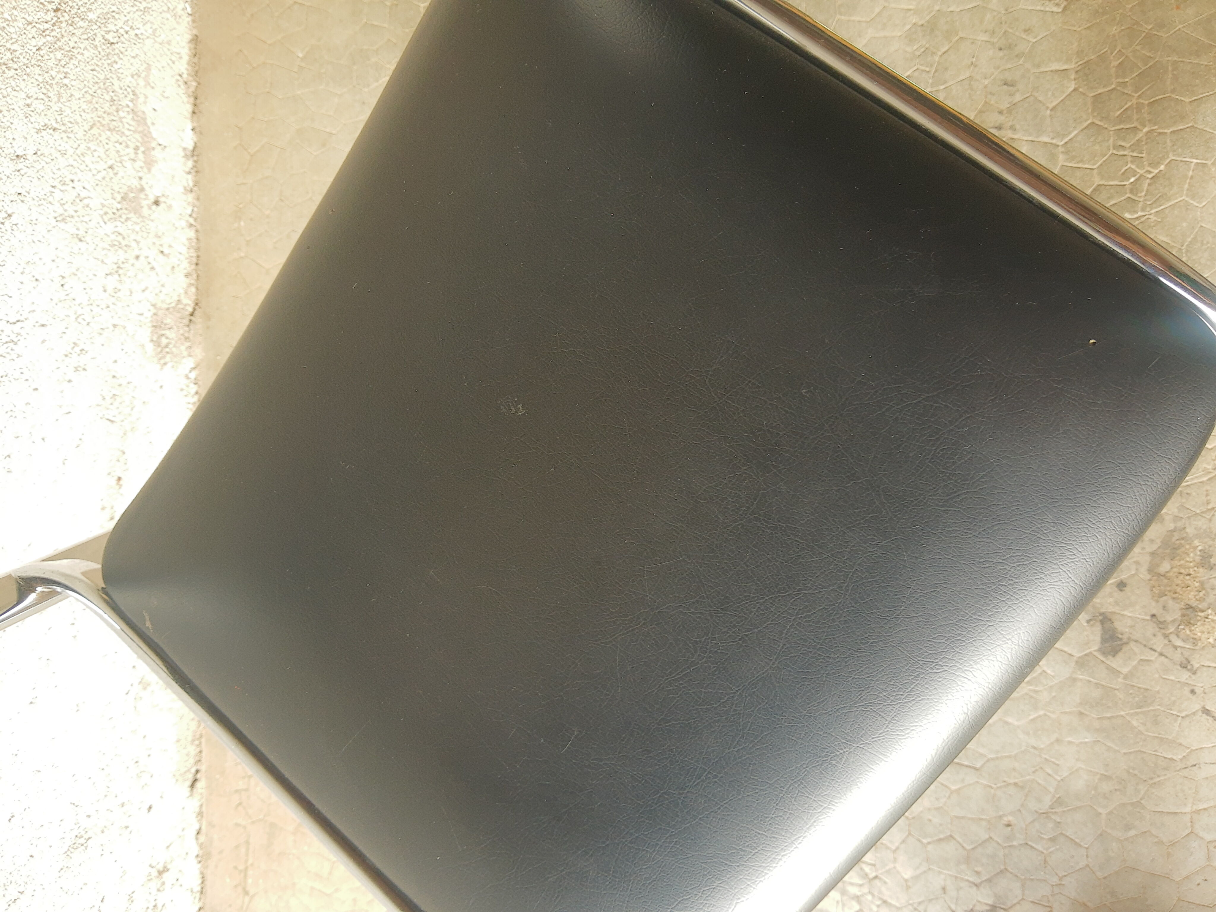 Vintage 70s black skai sled chair