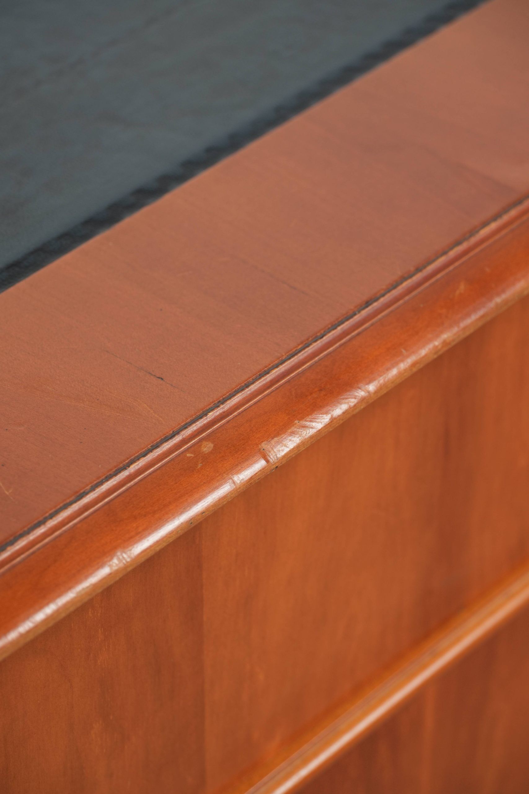 Classic wooden desk in English style with 4 drawers and a blue leather top