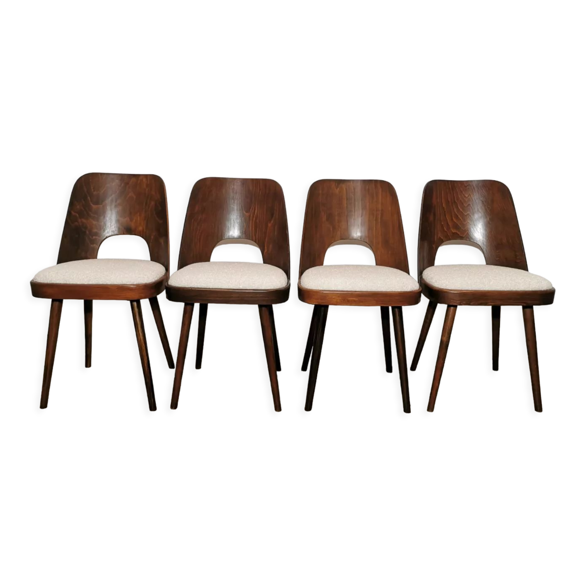 Dining chairs by Oswald Haerdtl