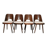 Dining chairs by Oswald Haerdtl