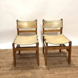 Pair of Maison Regain leather chairs