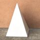 Minimalist white ceramic pyramid sculpture, 1970s.