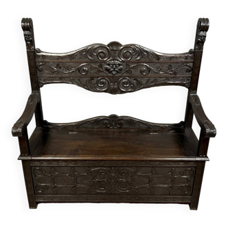 Italian Renaissance style solid wood chest bench decorated with grimacing masks