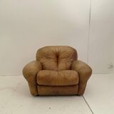 Pair of brown leather armchairs