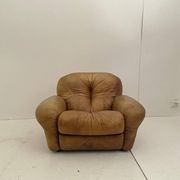 Pair of brown leather armchairs