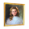 19th century oil on canvas depicting a portrait of a little girl with her gilded wooden frame