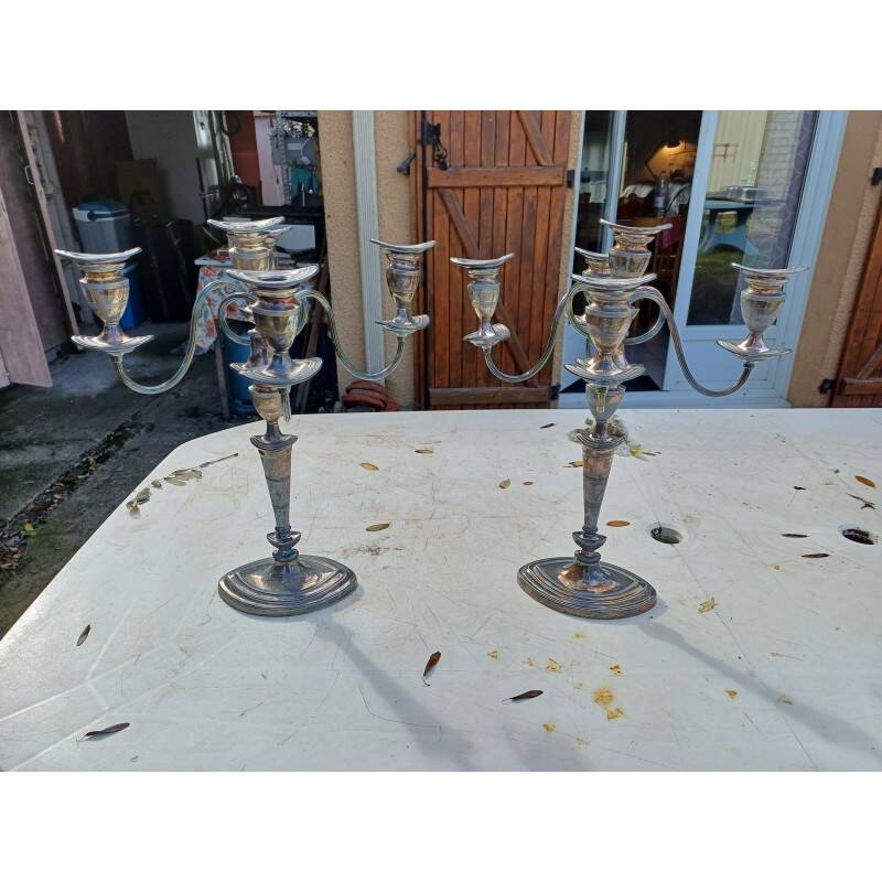 Pair of silver-plated metal candlesticks