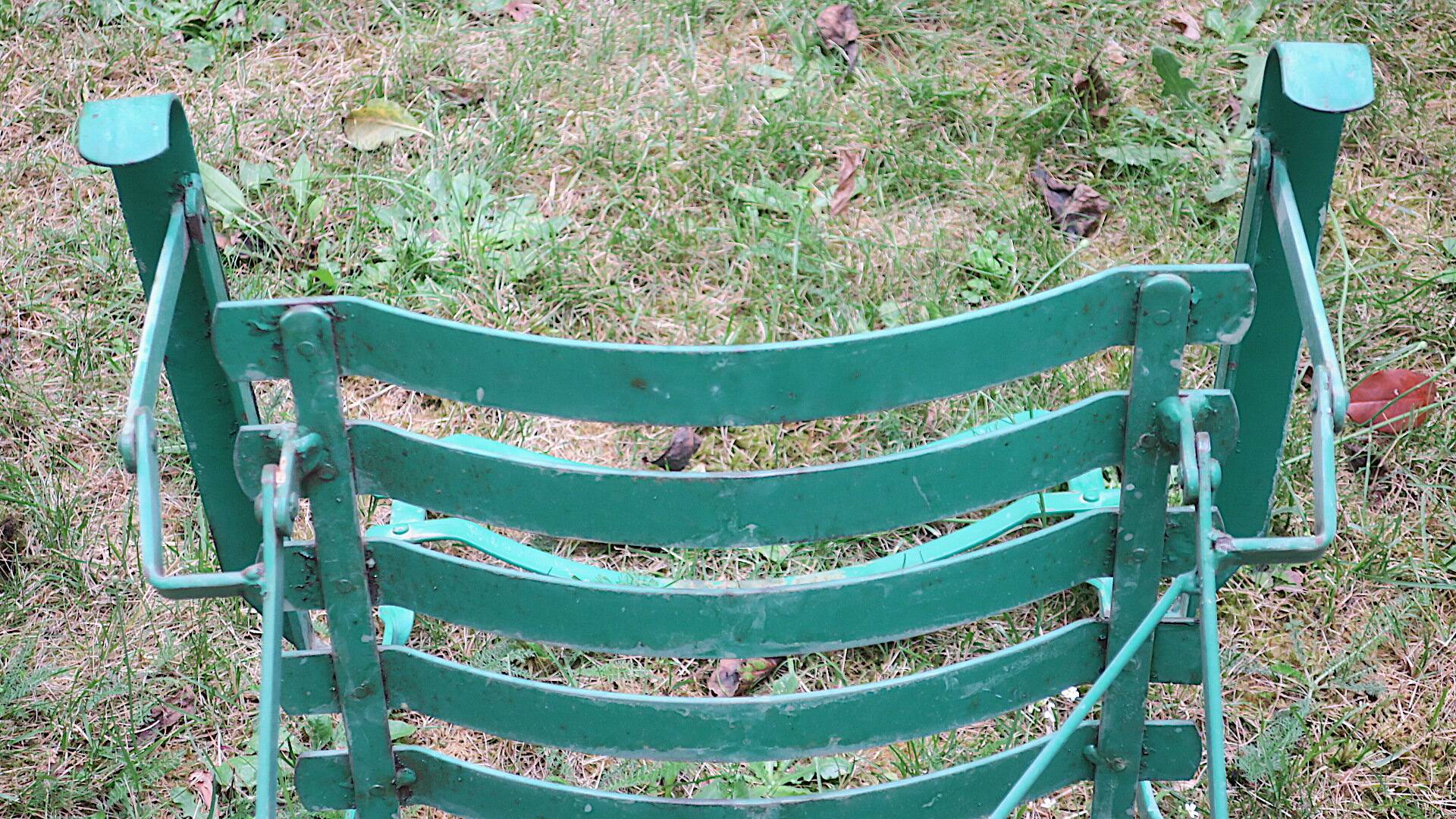 Pair of mid century distressed painted iron garden chairs