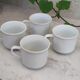 Coffee cup with floral design in porcelain