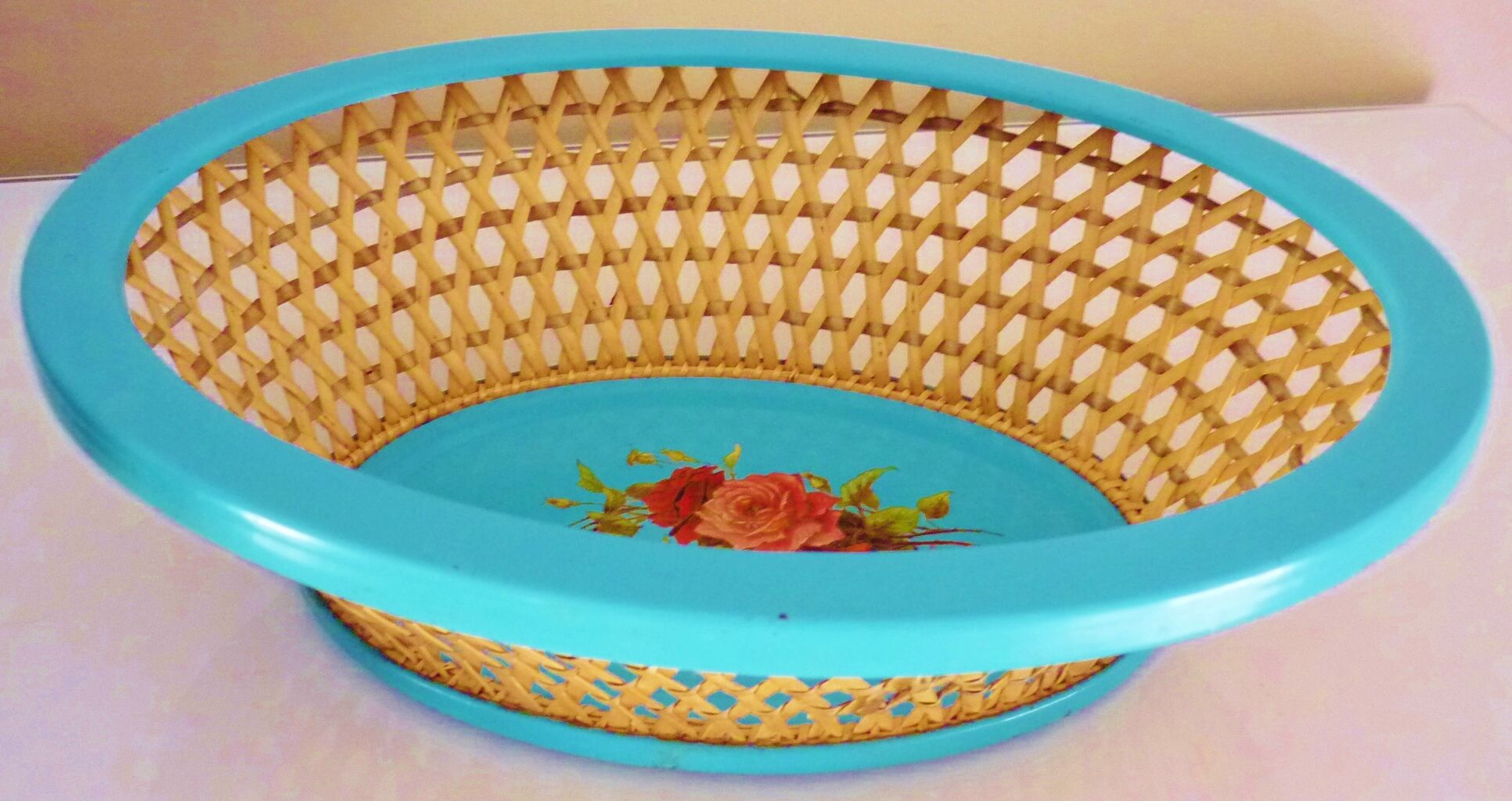Antique basket in painted sheet metal and woven wicker, decorated with roses