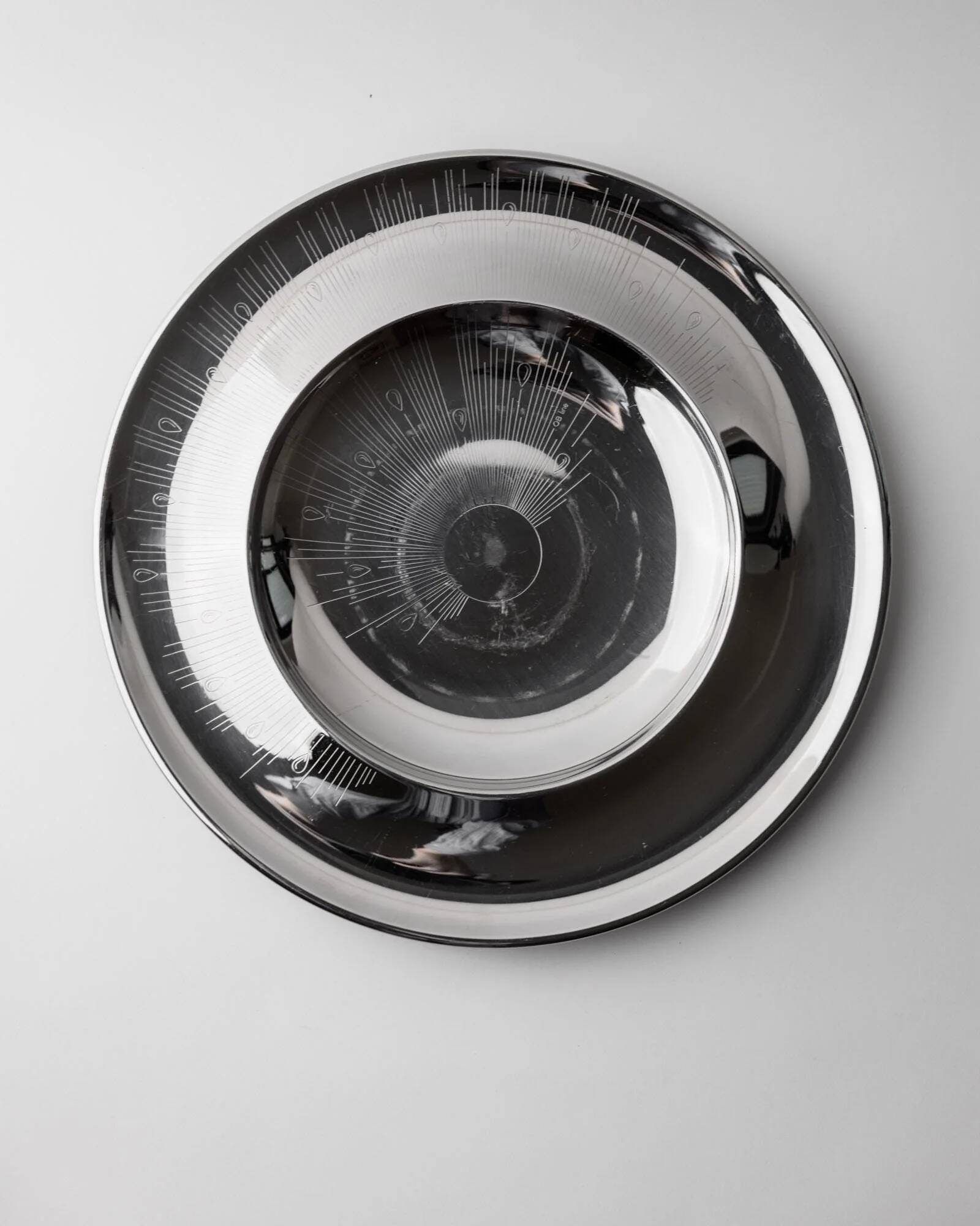 Vintage stainless steel bowl from the 1980s, polished metal with a finely textured surface, timeless elegant design, retro table decoration, noble gift idea.
