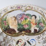 Capedimonté openwork plate, 4 seasons putto