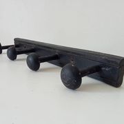 Old wooden wall coat rack