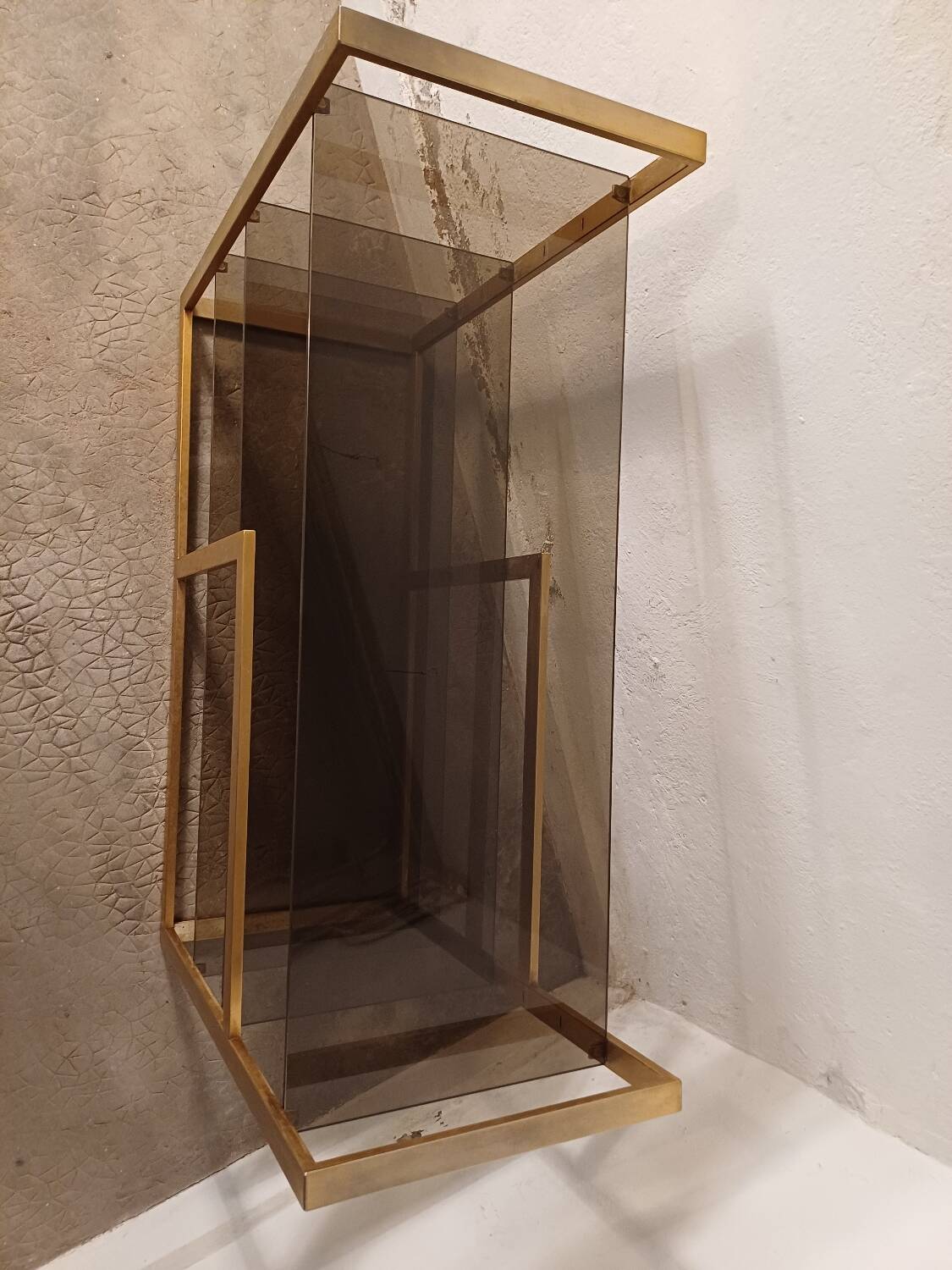 Brass shelf, smoked glass
