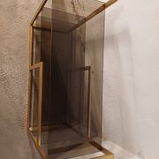 Brass shelf, smoked glass