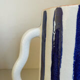 Klein blue and white striped ceramic vase with abstract handmade wavy handles