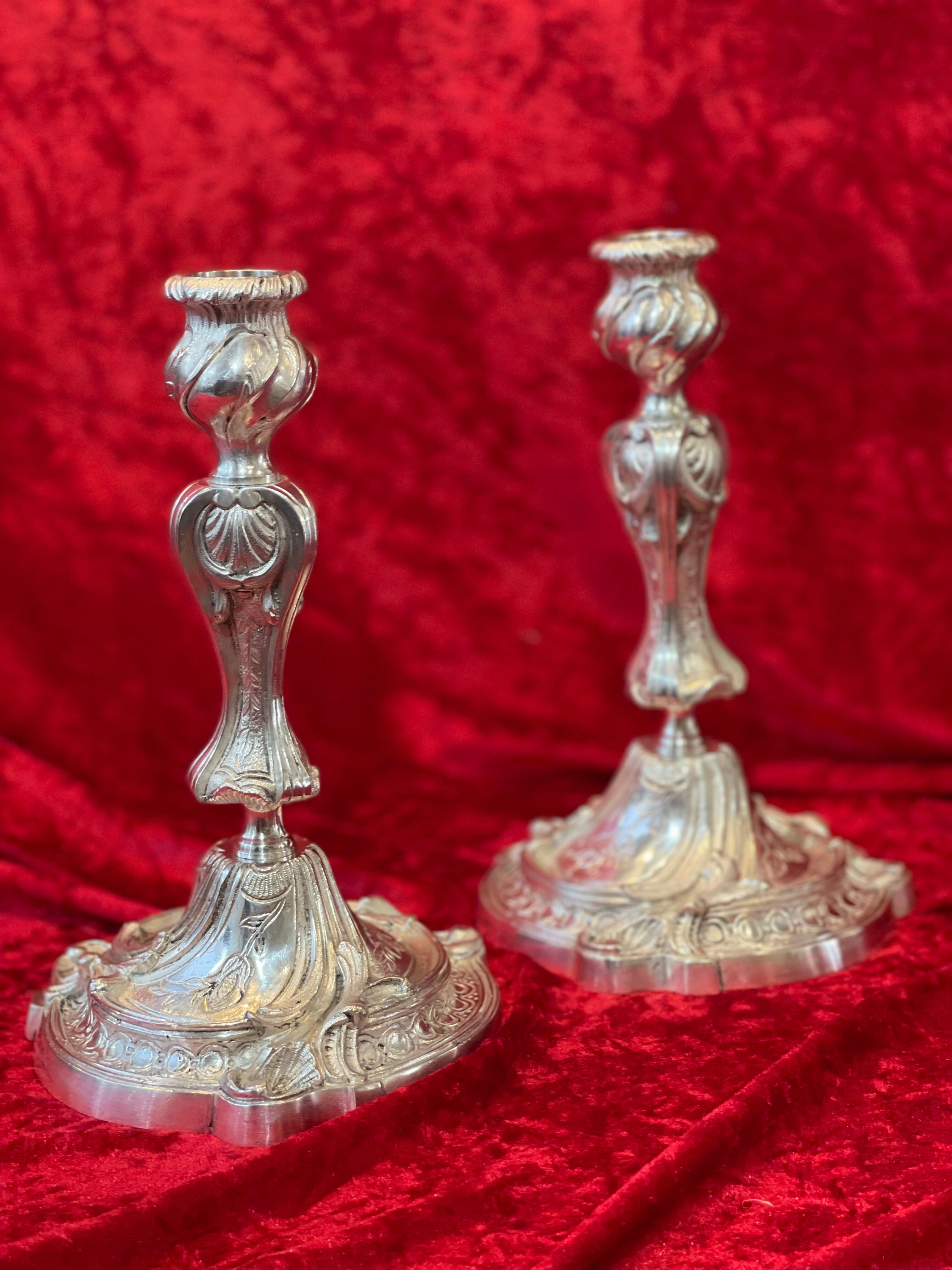 Pair of candlesticks, torches in silver bronze