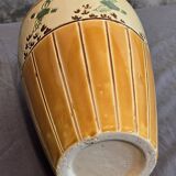Orange and green ceramic vase with duck motif
