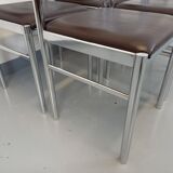 Set of 6 vintage chairs from the 70s in chrome metal and brown faux leather.