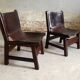 Pair of brutalist armchairs in wood and leather, 1970