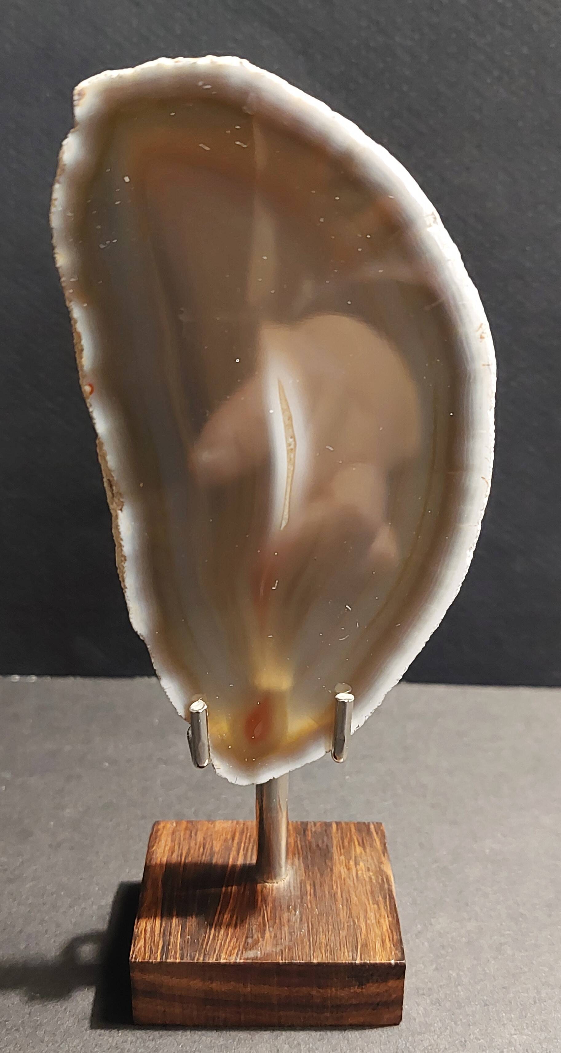 Mineralogy agate slice on base