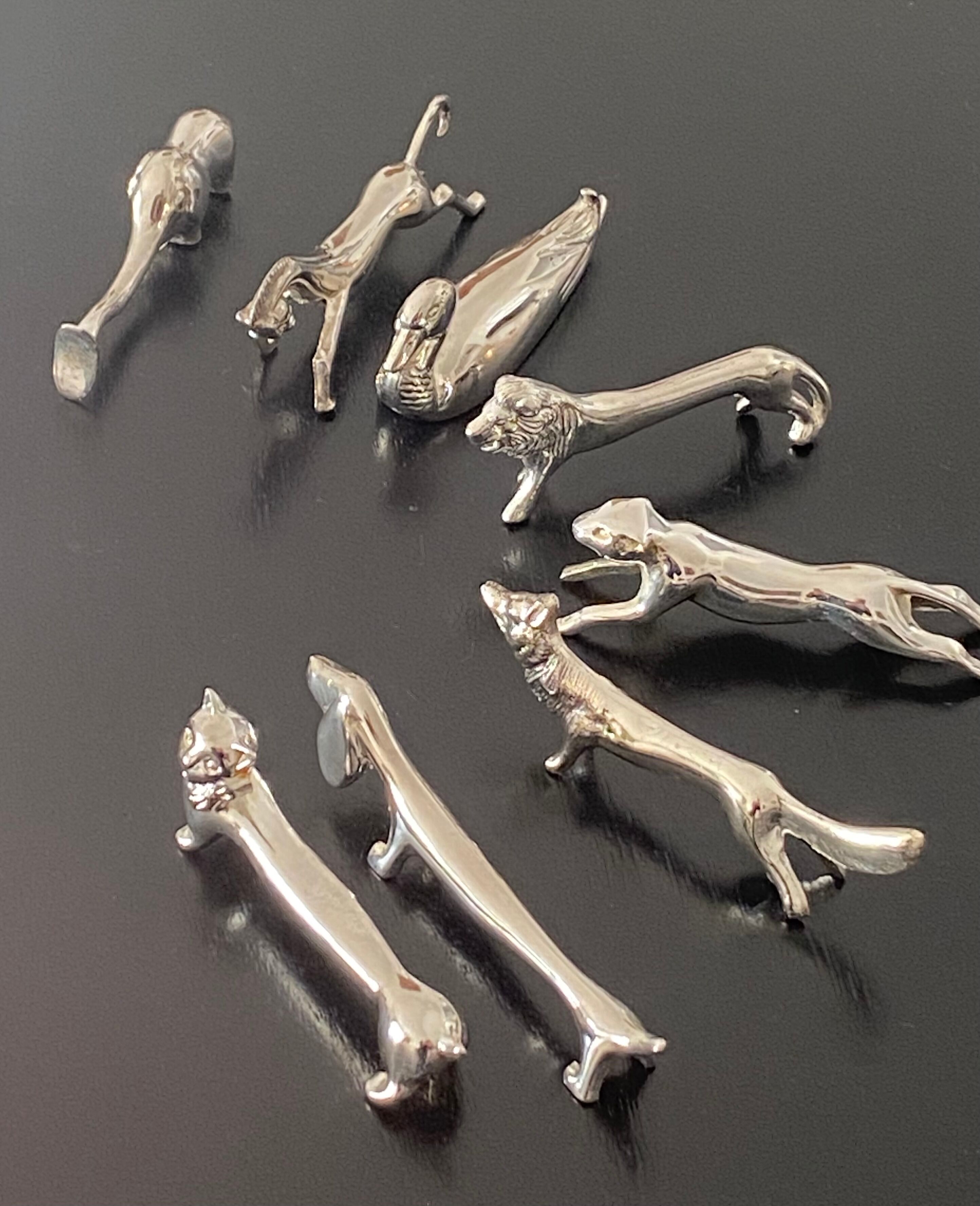 8 different animal knife holders