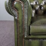 Spacious Chesterfield armchair in green patina