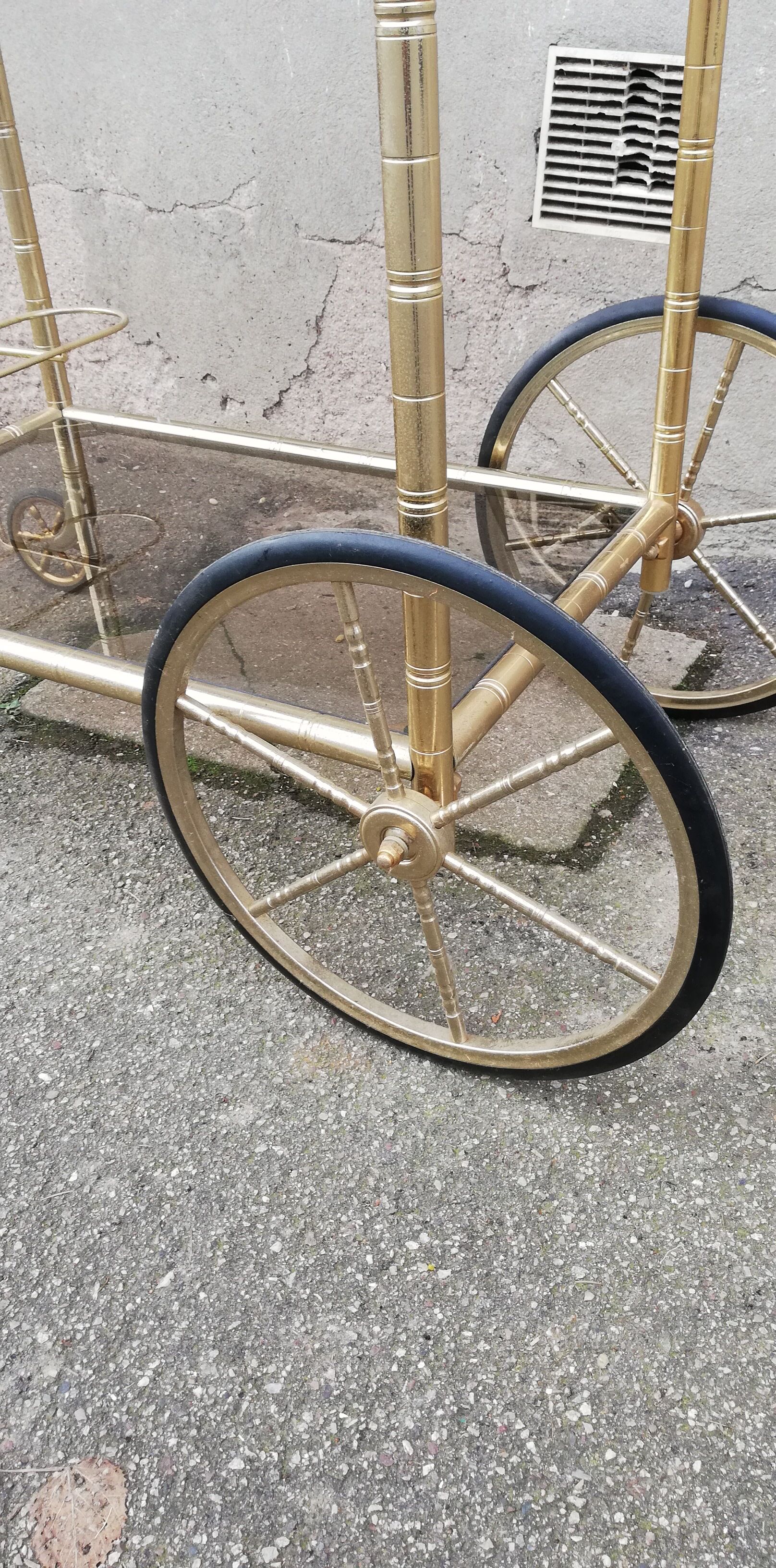 Vintage brass service 4 wheels