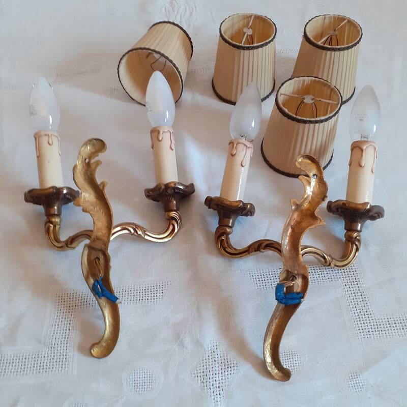 Pair of two-armed wall lights in gilded bronze, Louis XV style, by Lucien Gau.