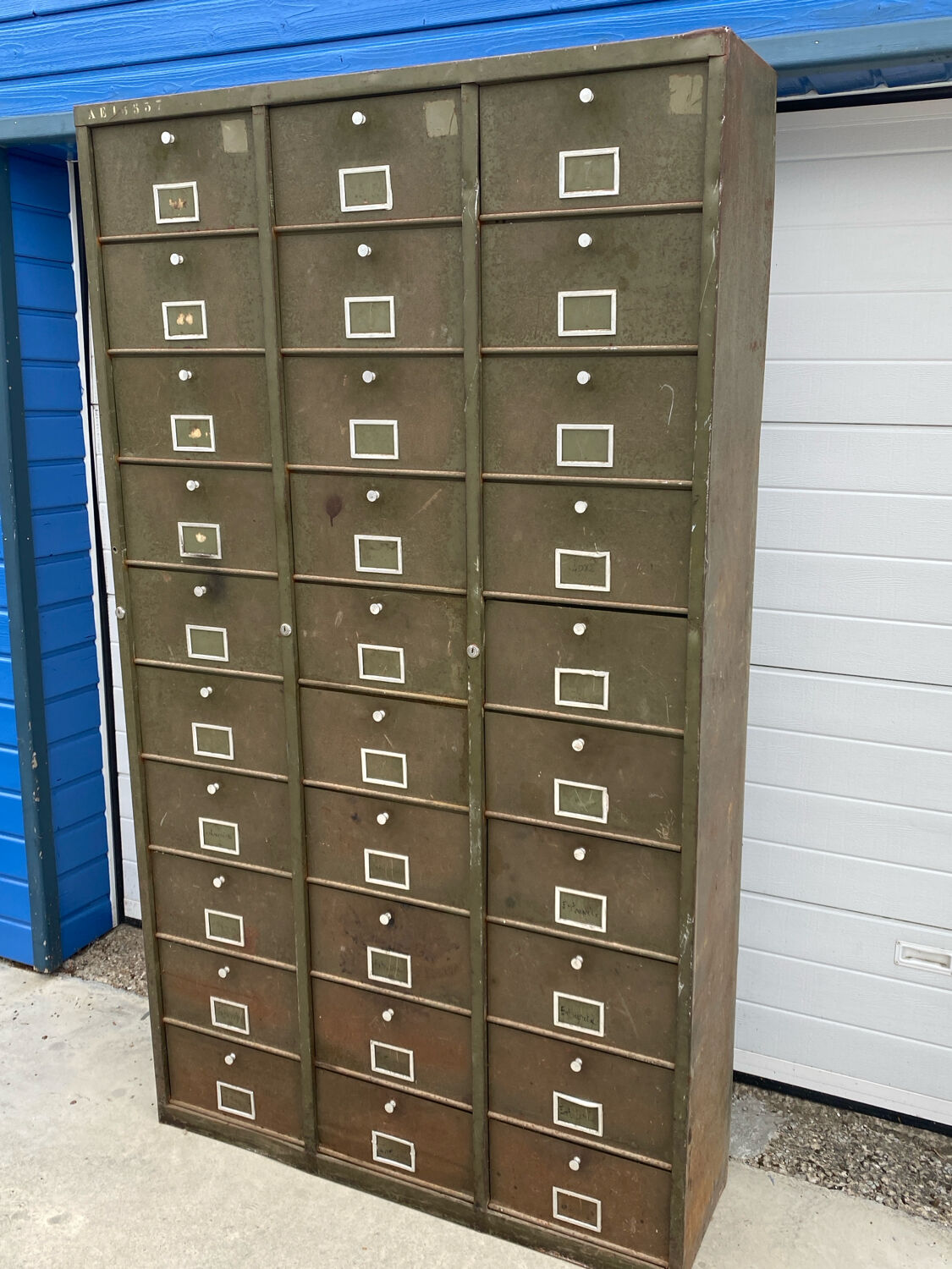 Military metal cabinet with hinged door