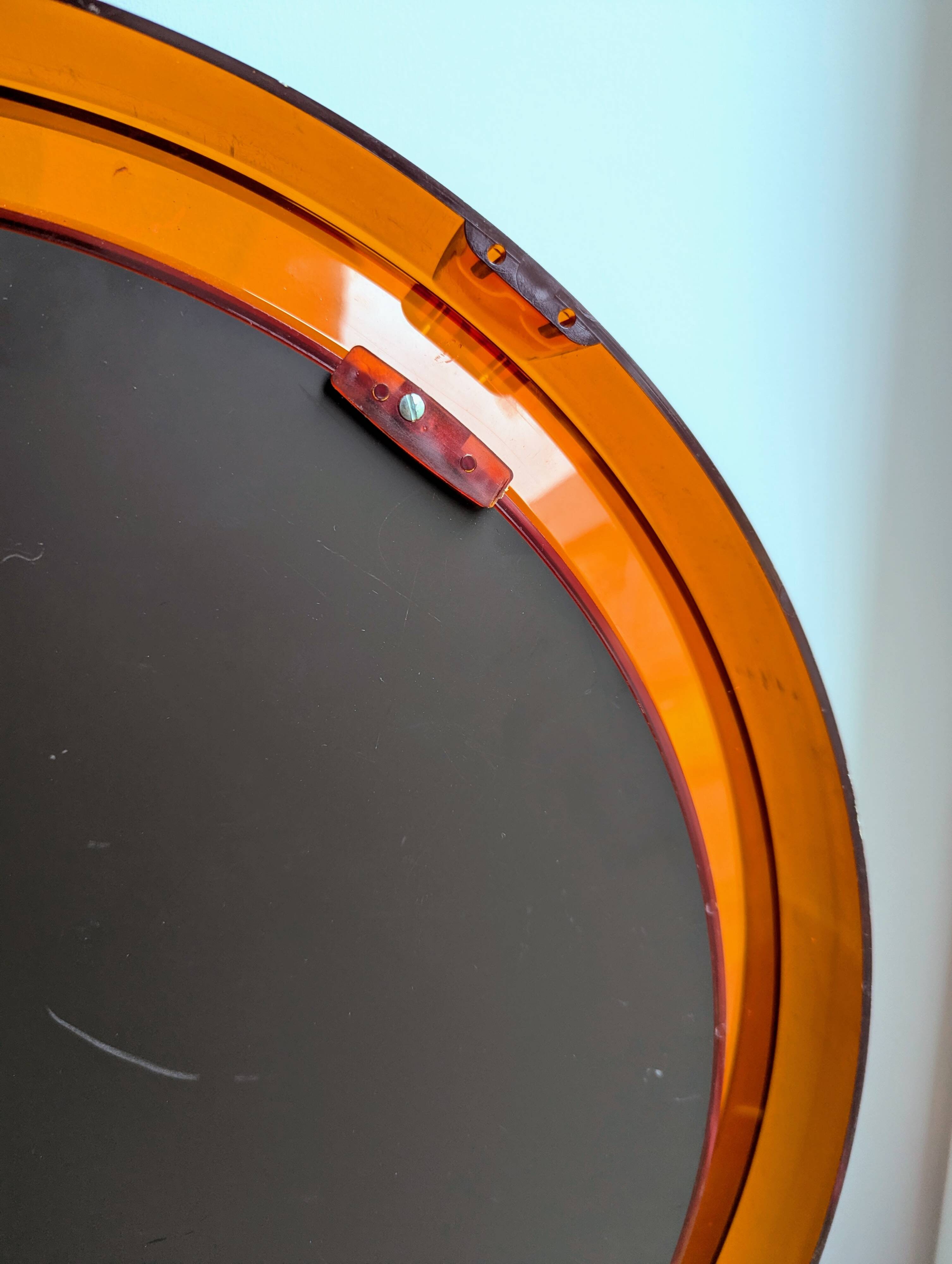 Vintage round orange plexiglass mirror Space Age 1970s
