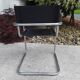 Cantilever skaï and chrome armchair