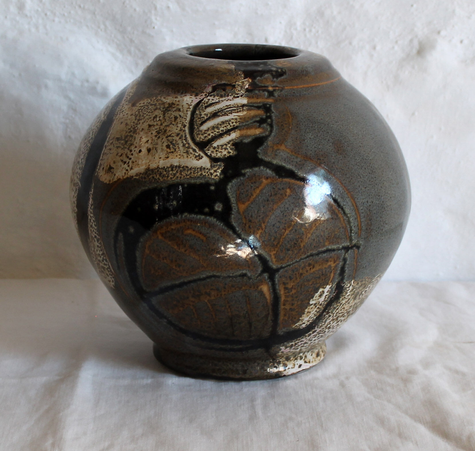 Enamelled sandstone vase