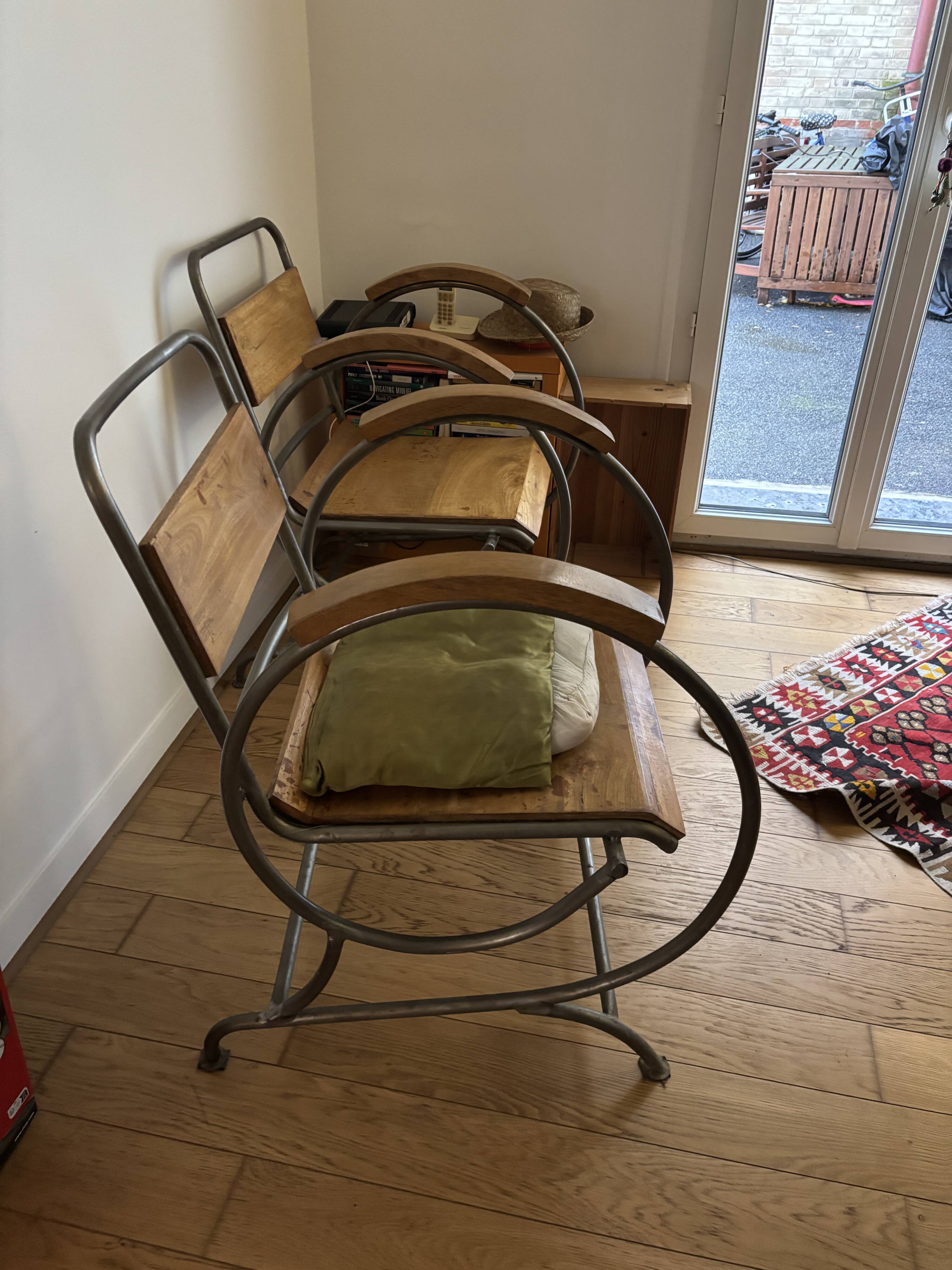 Wooden and metal armchairs
