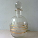 Pair of glass whiskey decanters with gold edging
